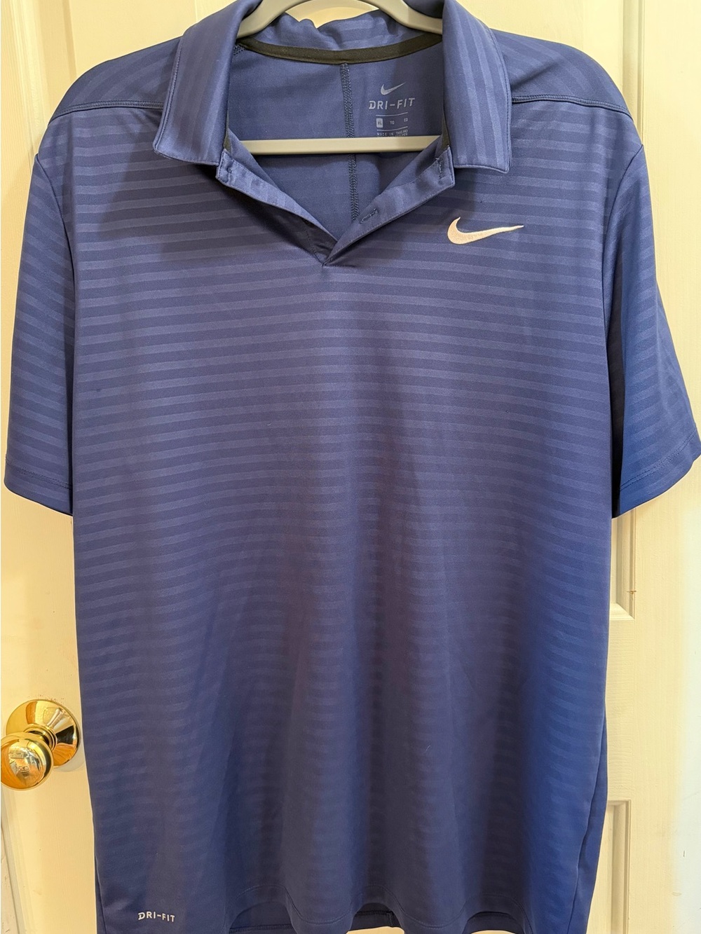 Nike Men’s Dri-FIT Polo Shirt in Blue with White Swoosh